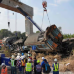 A crane collapsed on a train in Thailand, killing at least 32 people